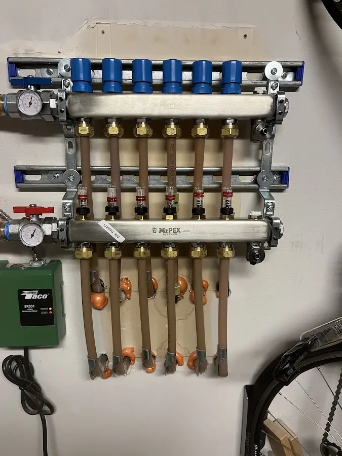 Plumber performing Leak Detection at a residential property in Reynolds